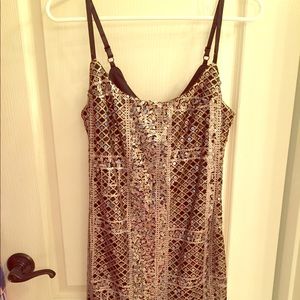 Black and gold sequin dress